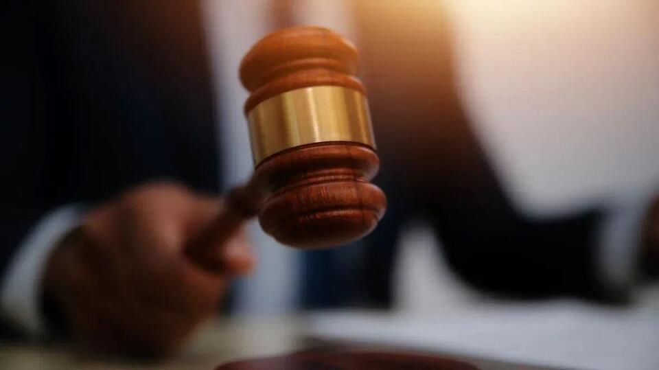 Columbia man sentenced to ten years in prison for possessing gun as a felon
