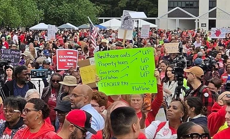 Top Education Panel Says ‘Historic’ Teacher Pay Raises Not Enough