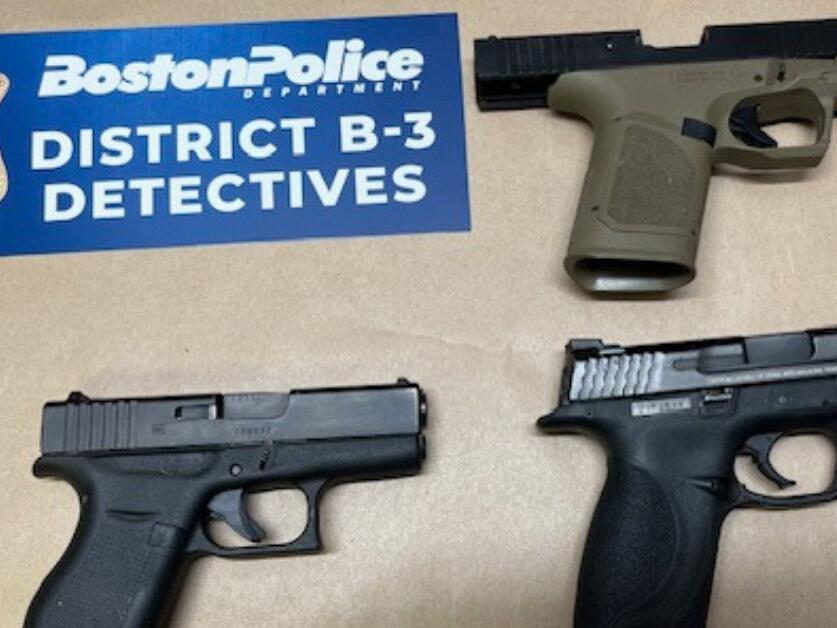Boston police arrest two, seize firearms after pursuit