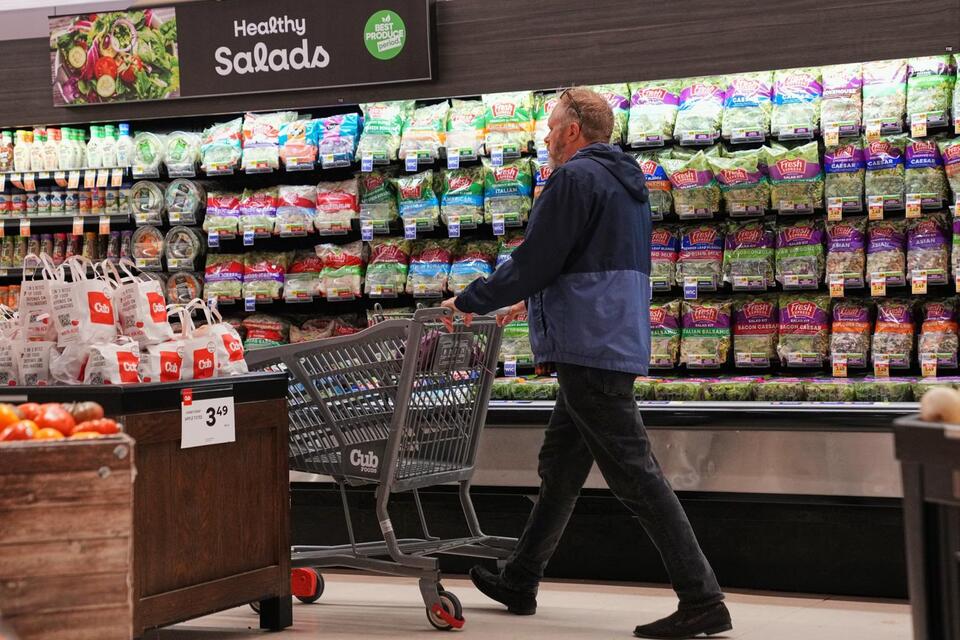 Americans react to higher prices, say they’re cutting back on spending