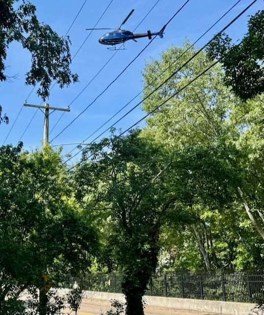 Helicopter Over Downtown EG Prompts Questions