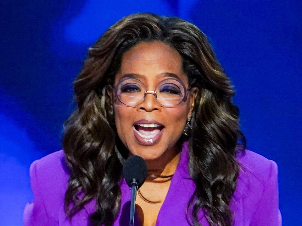 Oprah Winfrey Flaunts Her Weight Loss In A WaistCinching Purple
