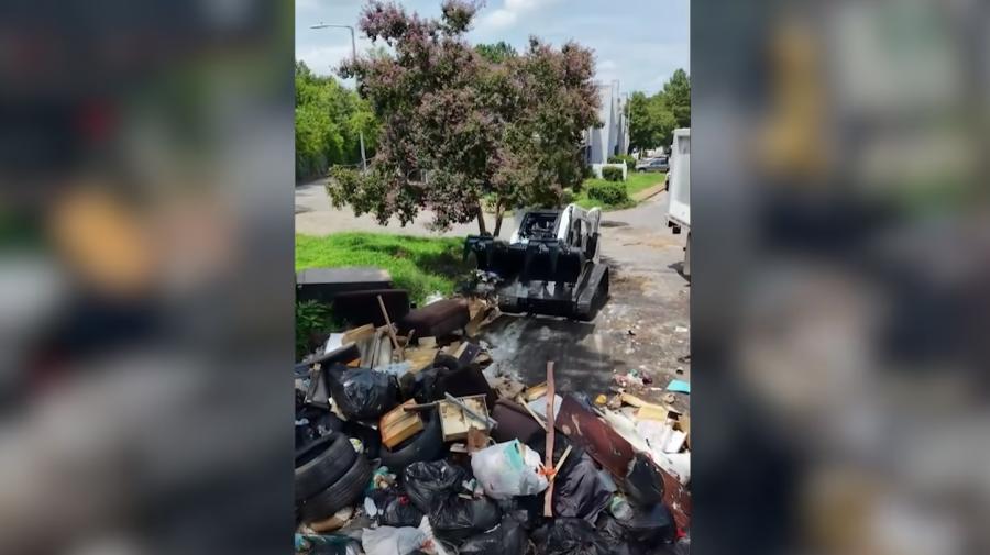 Memphis apartment complex's trash piles removed with city help