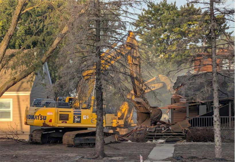 Demolition finally begins on Rock Valley homes damaged by 2024 flooding ...