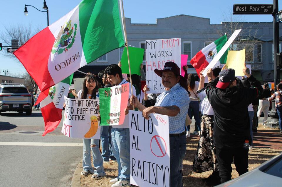 Hundreds Protest Immigration Crackdown on Marietta Square - NewsBreak