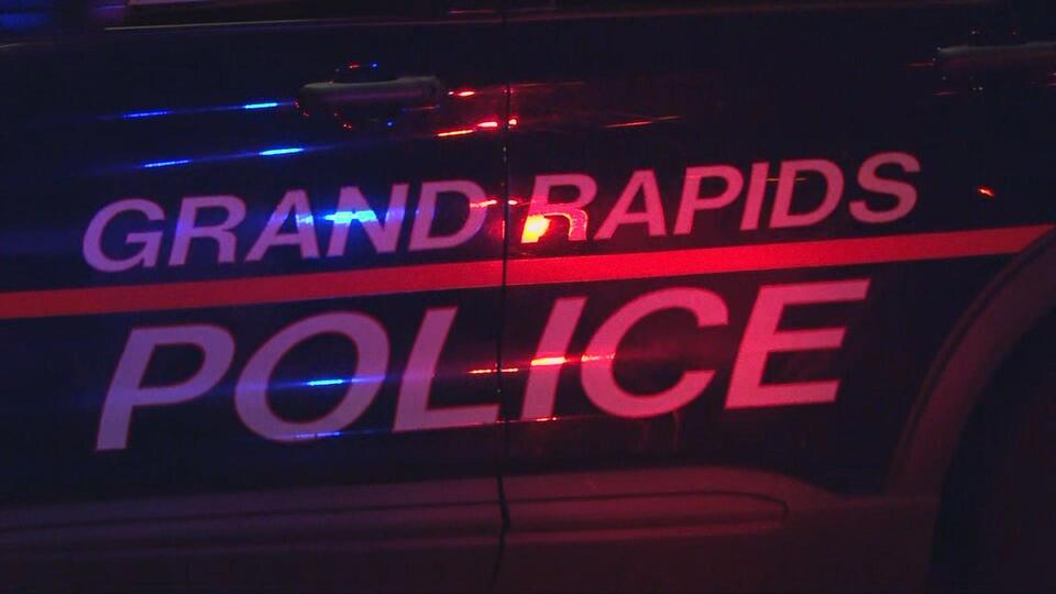 Police: Woman killed in crash after car runs red light in Grand Rapids ...