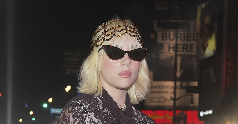 Billie Eilish Stuns in See-Through Burgundy Lace Gown & Heels for Gucci’s Love Parade Fashion Show – NewsBreak