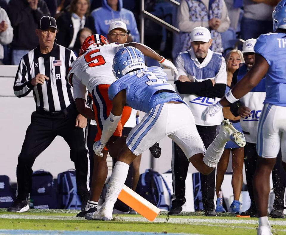Syracuse wins OT thriller on winning 2-point conversion by Calvin Russell: Final score, recap, photos