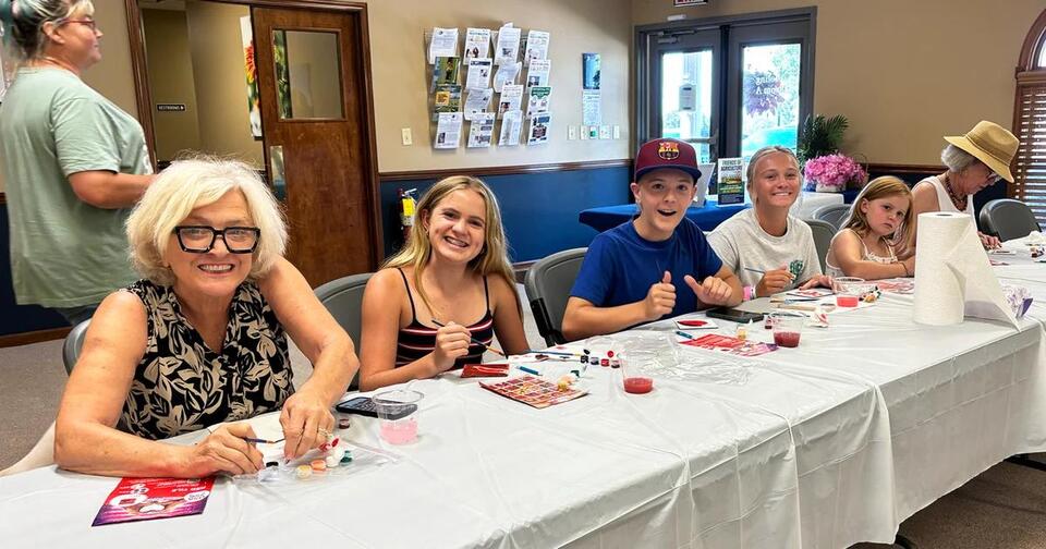 Community comes together to paint