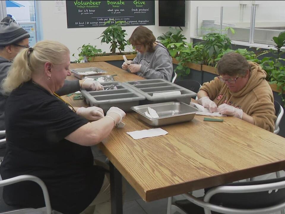 Members of Sunshine Communities volunteer at Toledo's SAME Café