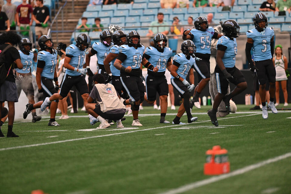 Huskies keep pounding, pulverize Cardinal Gibbons at Panthers stadium