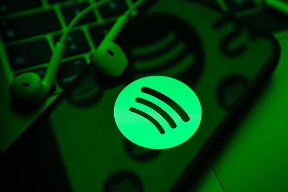 Spotify says it removed 50 million ‘slop’ and spam AI tracks this year ...