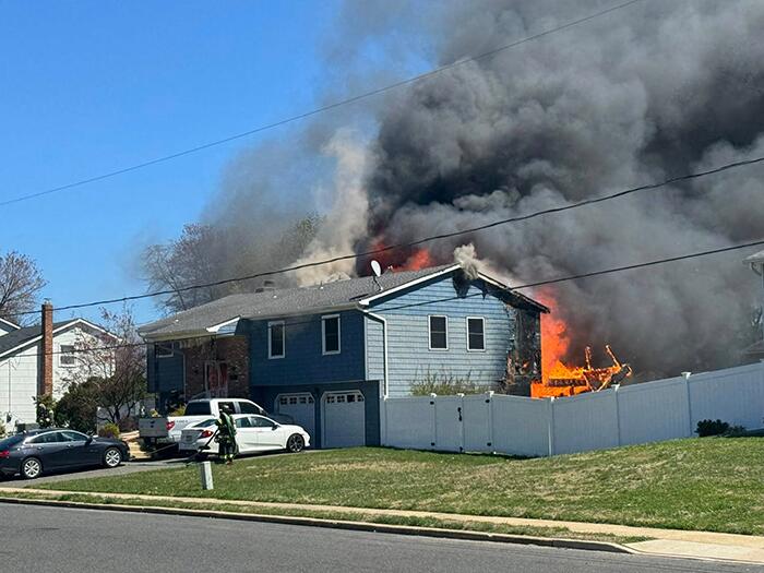 Police Officer, Family Escape Fast-Moving House Fire - NewsBreak