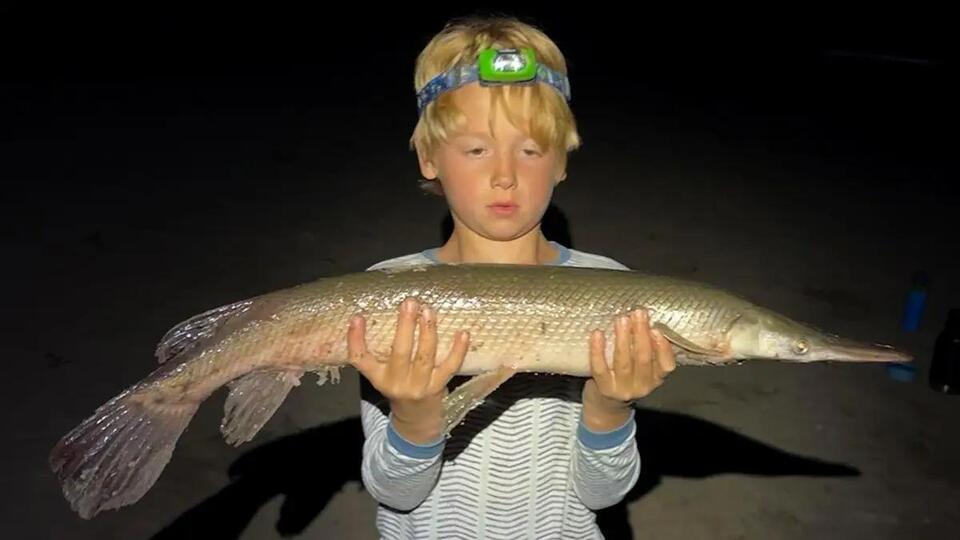 Clad in His Pajamas, 7-Year-Old on a Family Fishing Trip Catches State-Record Gar
