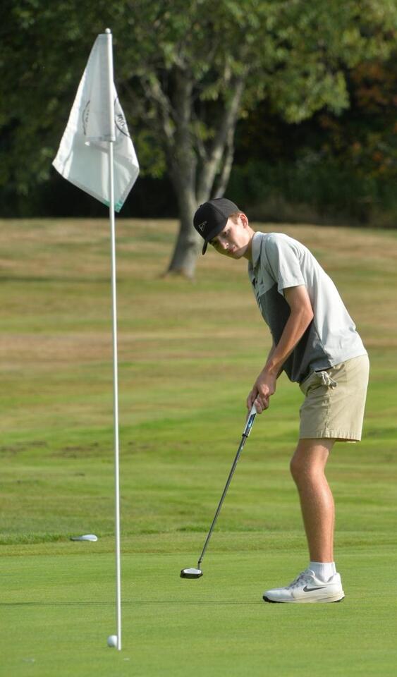 Lincoln Golf Wins Opener Over Lions