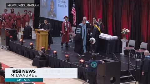 Sister surprises brother at high school graduation after serving ...