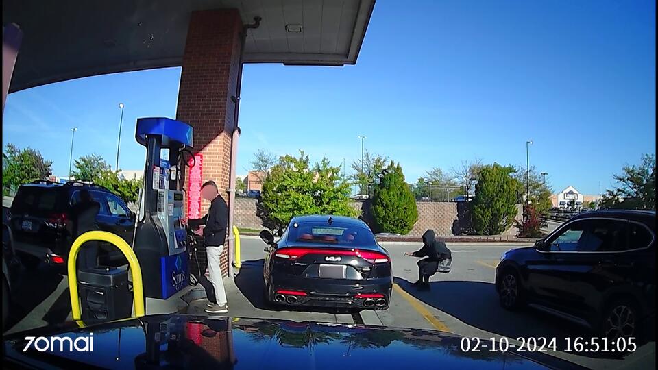 Car thief caught on camera making off with car as owner pumped gas ...