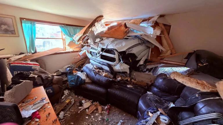 3 people injured after truck crashes through wall of Fall River home ...