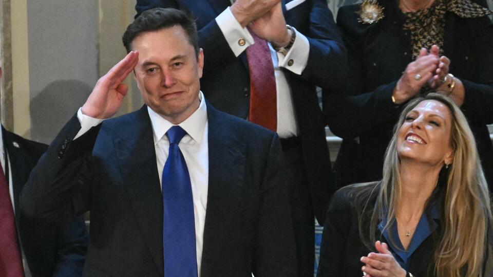 Mystery Blonde Woman Seated Next to Elon Musk at Trump’s Address Is ...