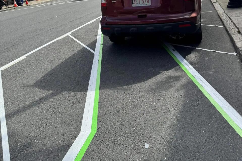 Duct-tape bike lane appears at Boston intersection following cyclist's ...