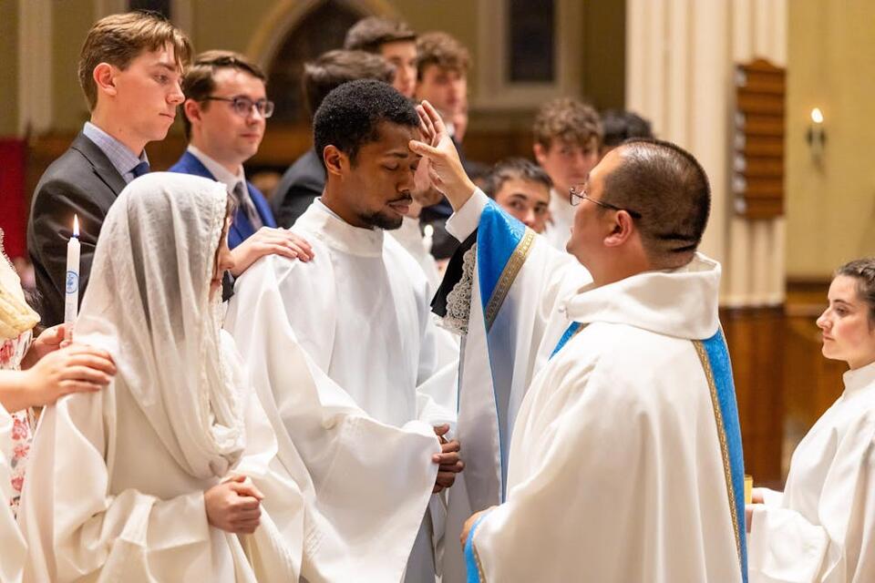 Record cohort of students prepare to receive Catholic sacraments ...