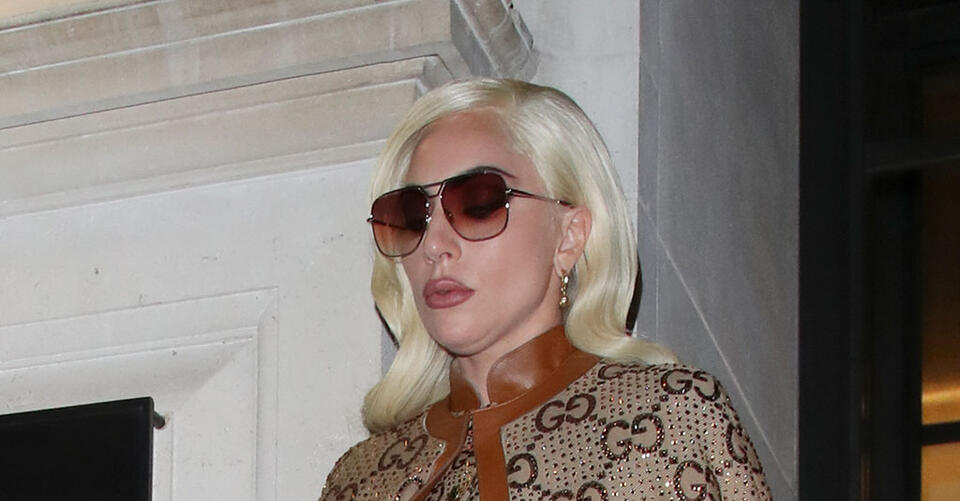 Lady Gaga Soars in 8-Inch Heels With Gucci Logomania Dress and Cape in London – NewsBreak