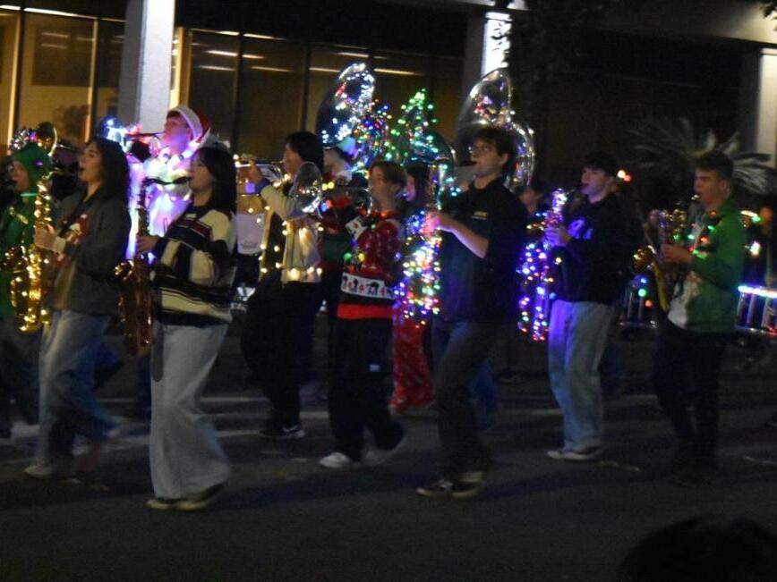 Discothemed holiday parade is a (mirror) ball as it winds through