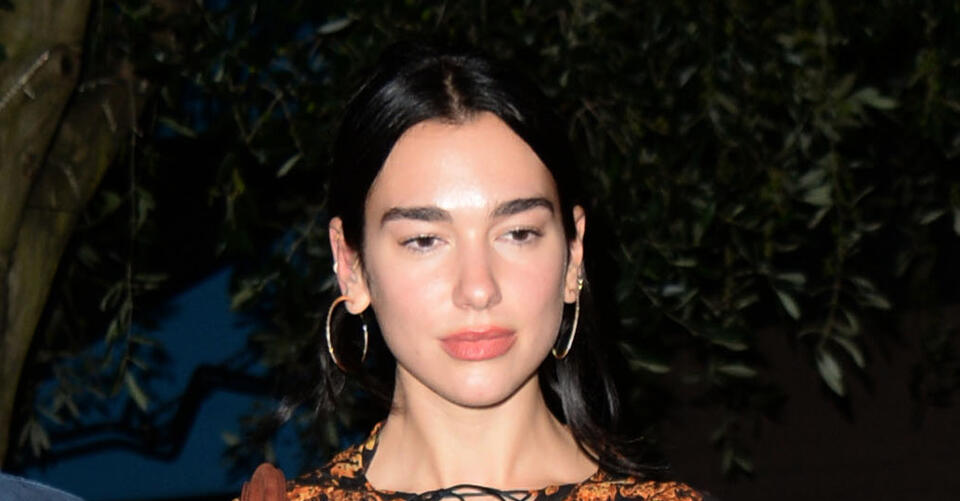 Dua Lipa Upgrades the Catsuit Trend in a See-Through Onesie & Chunky ...