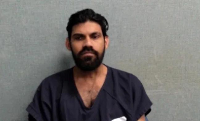 Truck driver charged with killing couple arrested by ICE after release ...