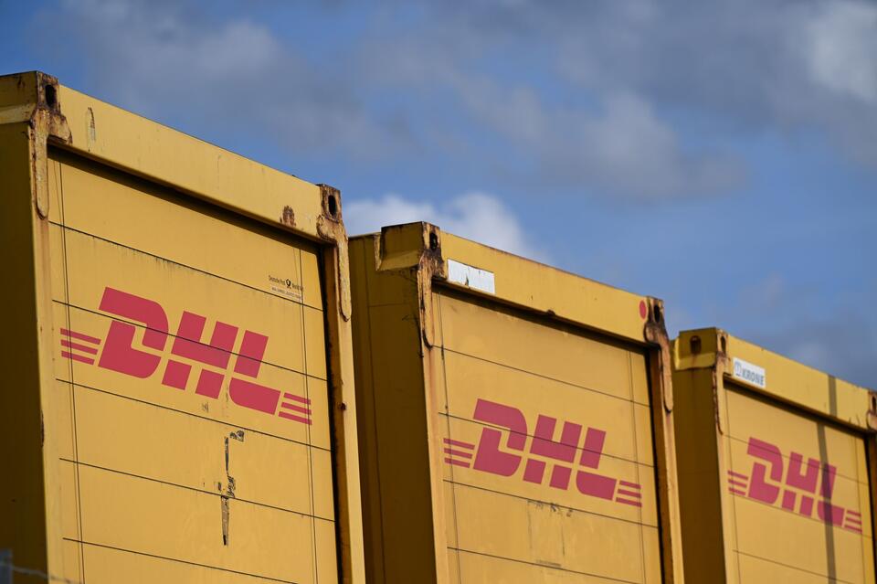 Deutsche Post delivers a name change as letters fade, turning into DHL ...