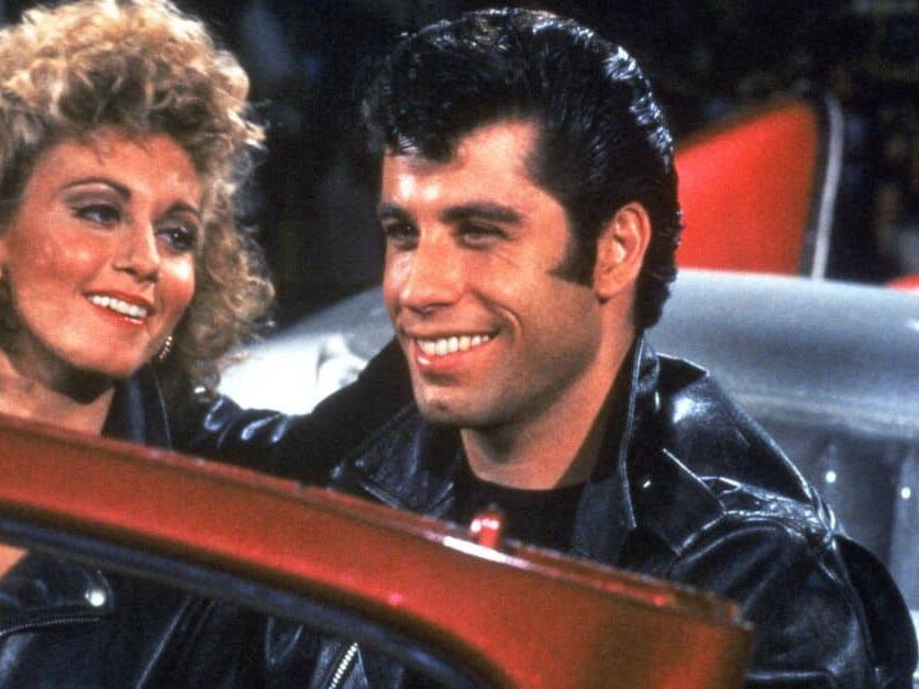 ‘Grease’ Casting Director Calls Film “NonPC Fairy Tale” In Response To