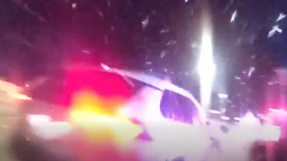 Close call: Video captures moment driver plows through police car door ...