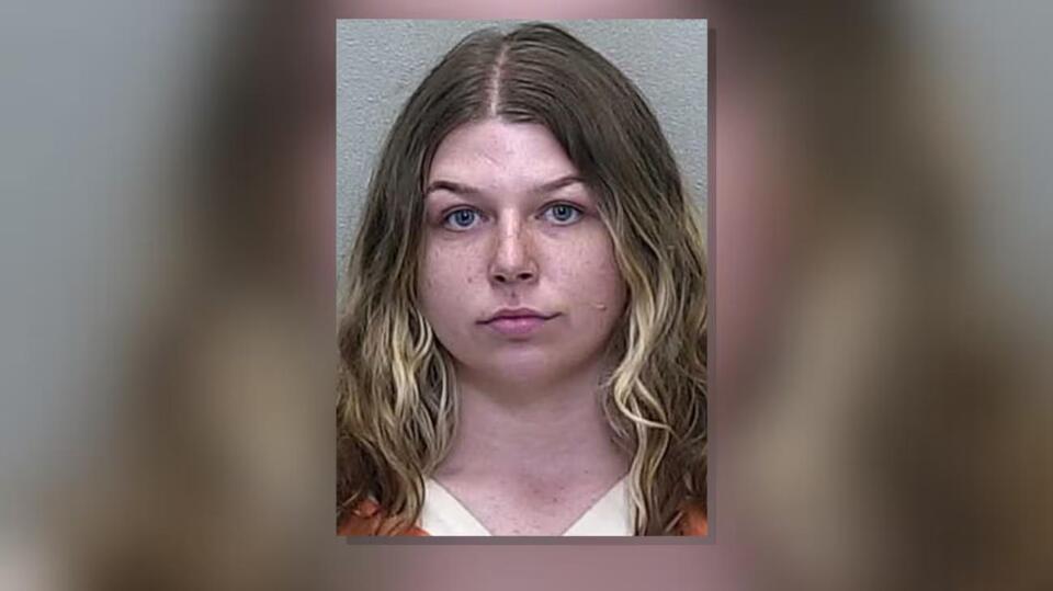 Woman arrested after ramming car with children inside at Dollar General ...