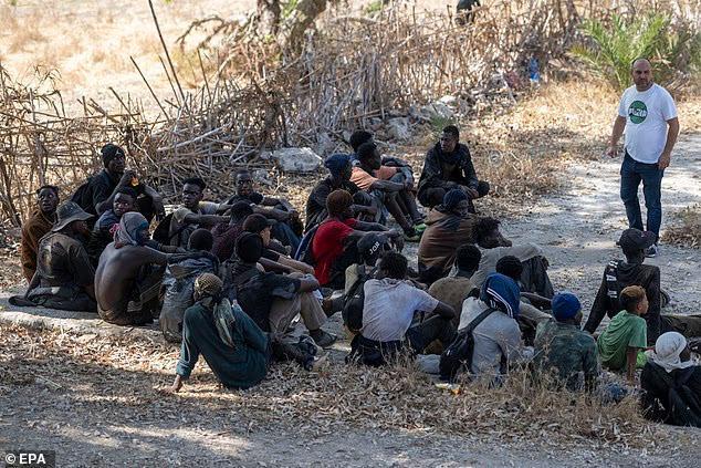 Riot police block hundreds of migrants attempting second Ceuta surge