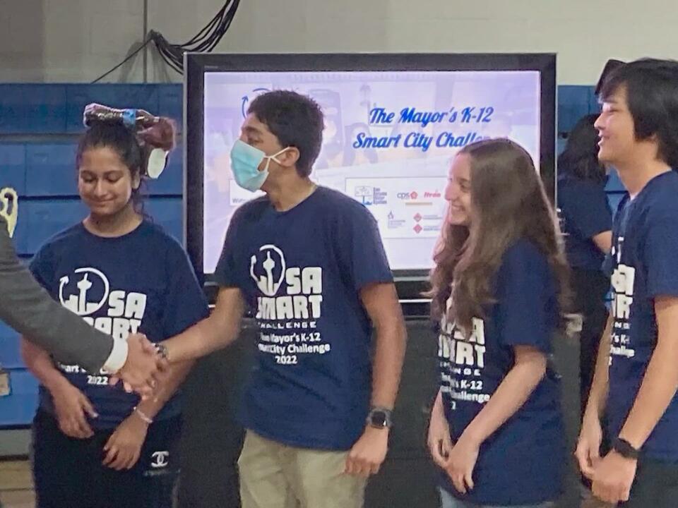 Local high school seniors work to help low families save on