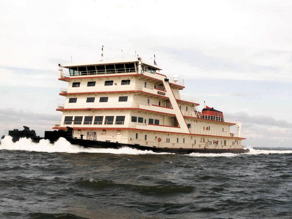 1st tow boats breaking through ice at Lake Pepin