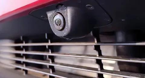 New Tesla Model Y FSD camera cleaning system demonstrated on the 2025 ...