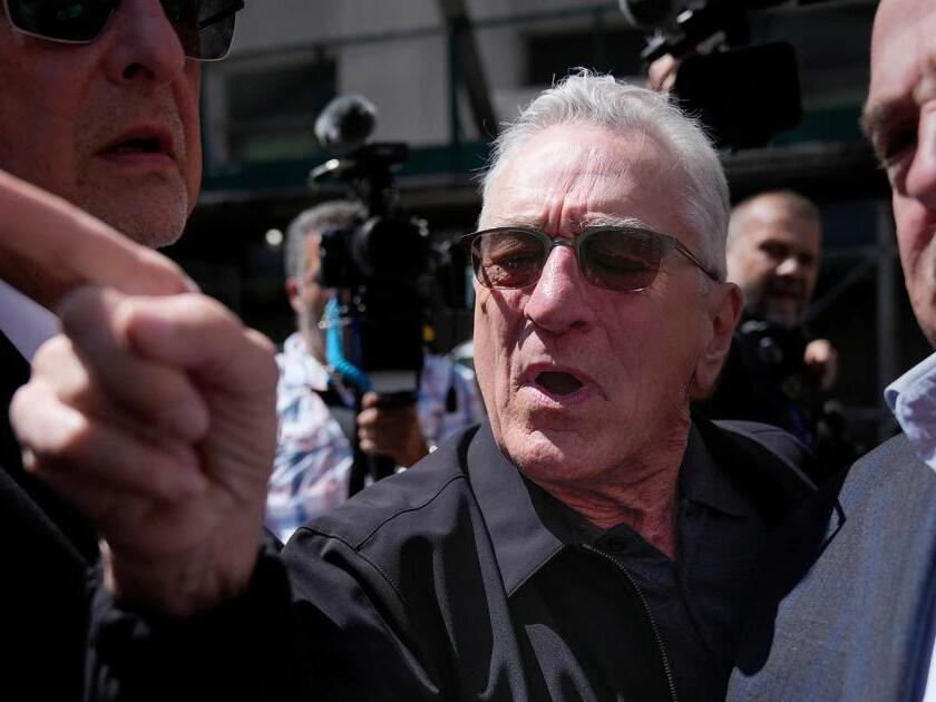 'You are gangsters!' Robert De Niro clashes with Trump supporters in
