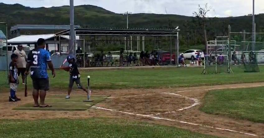 A Lady Jays player hits a triple against the Blue Jays during an NMISA x DYS T-Ball League game at the Francisco 