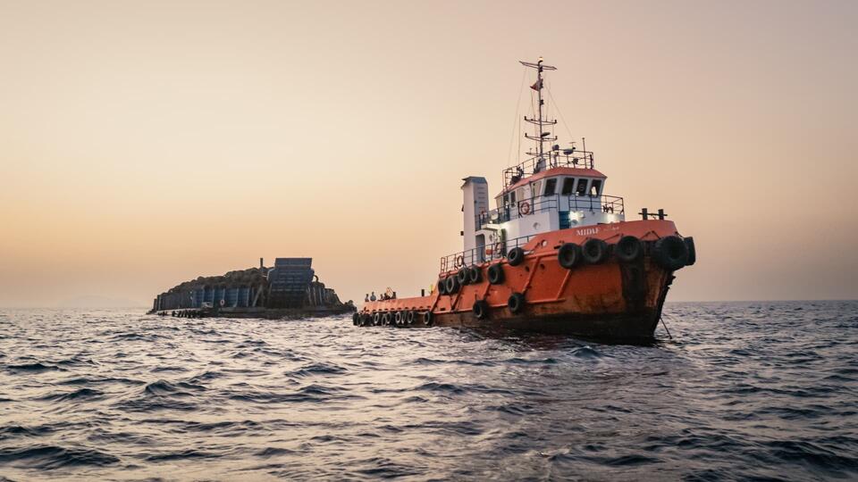 Oil prices little changed on negotiations to manage ship traffic in Strait of Hormuz