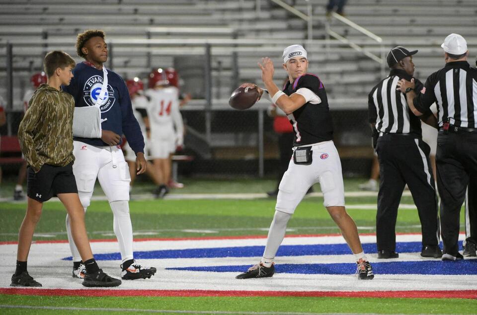 Freshman Briggs Berlin, with No. 1 supporter at his side, assumes QB ...