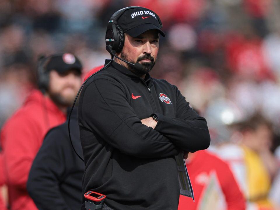 Ohio State football coach denies sending Michigan signs