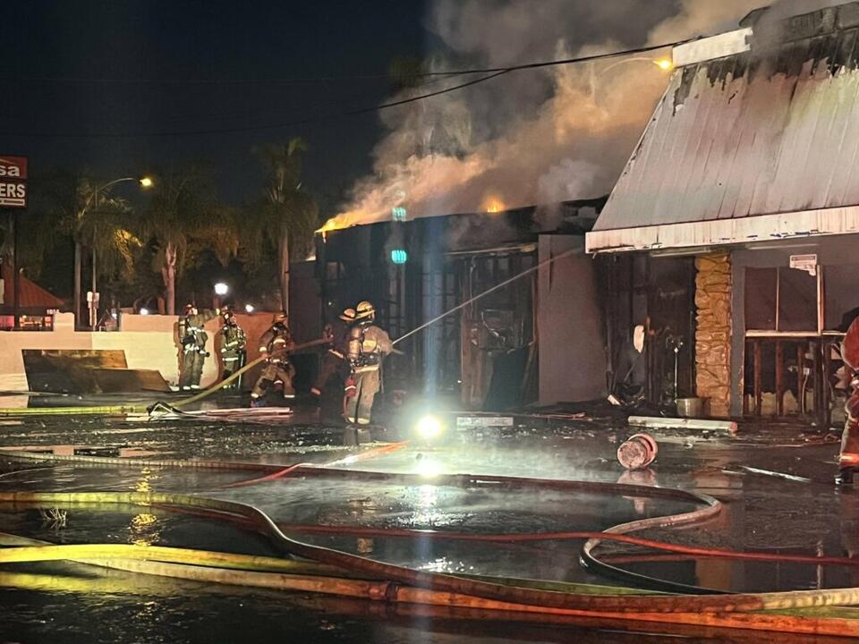 Firefighters douse 2-alarm fire at abandoned building in Washington ...