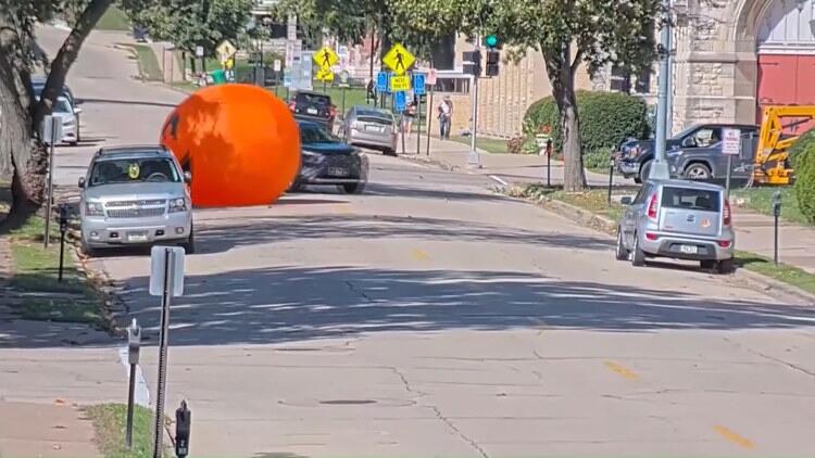 Giant inflatable pumpkin rolls into traffic - NewsBreak