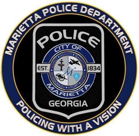 One dead, one in custody after shooting at Marietta Chevron - NewsBreak