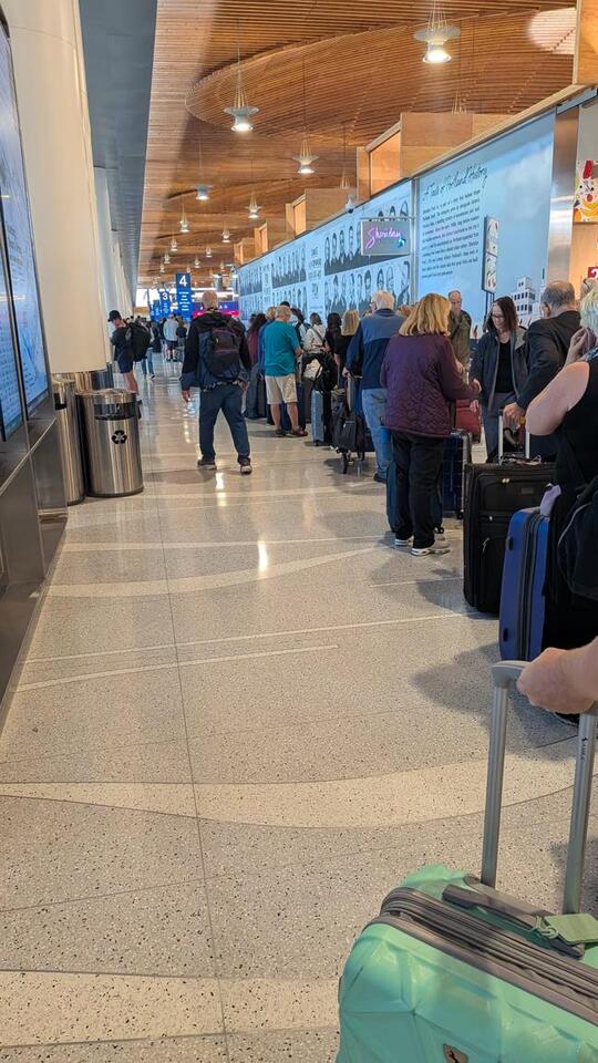 PDX travelers face long wait times, possible delays amid internet ...