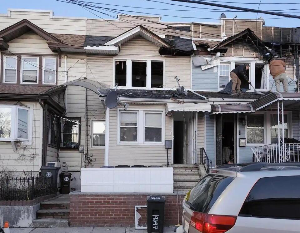 More than a dozen displaced after two-alarm fire tears through three ...
