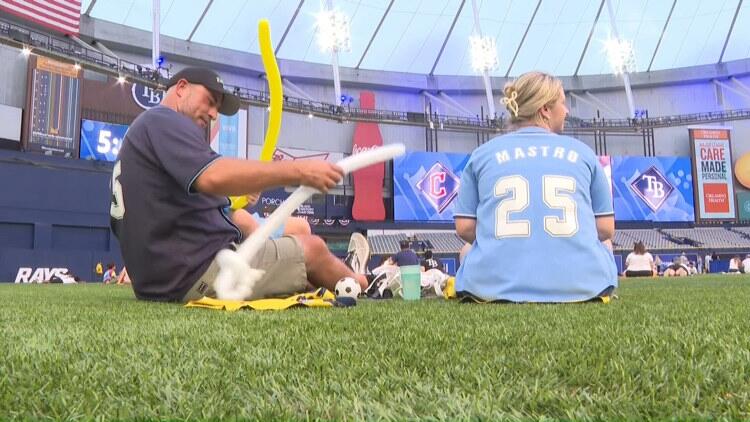 Rays fans at Tropicana Field cheer on their team during watch party ...