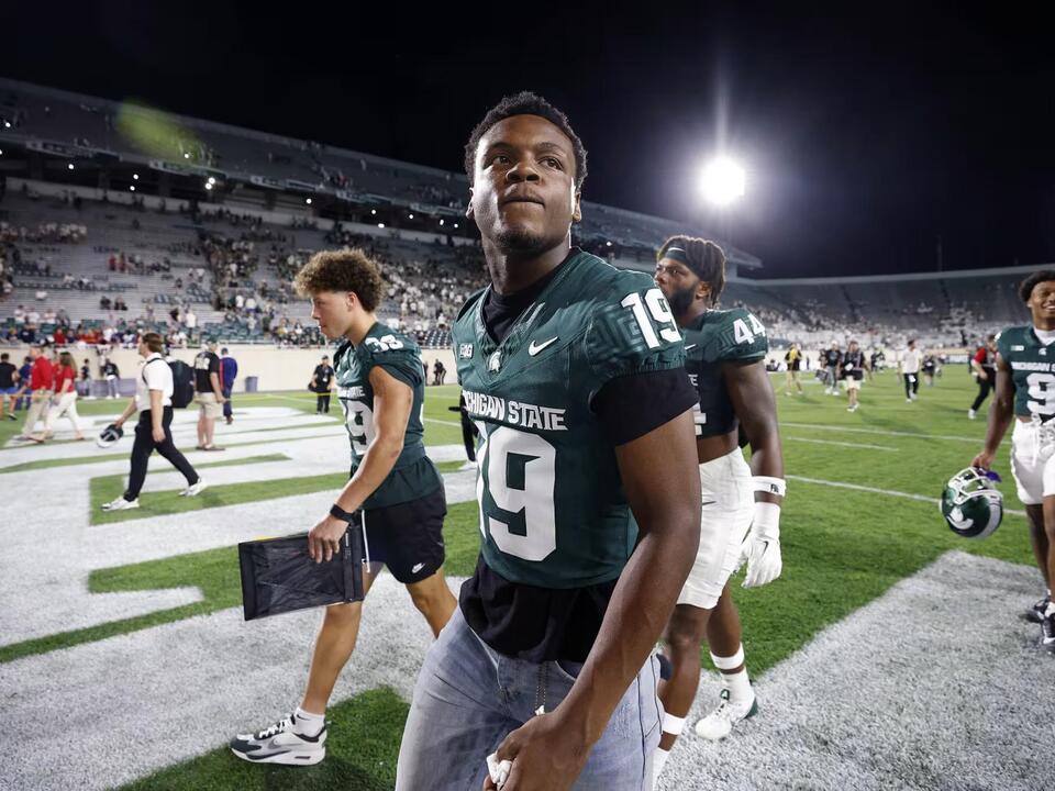 Michigan State football player lost his mom to cancer. He's now raising