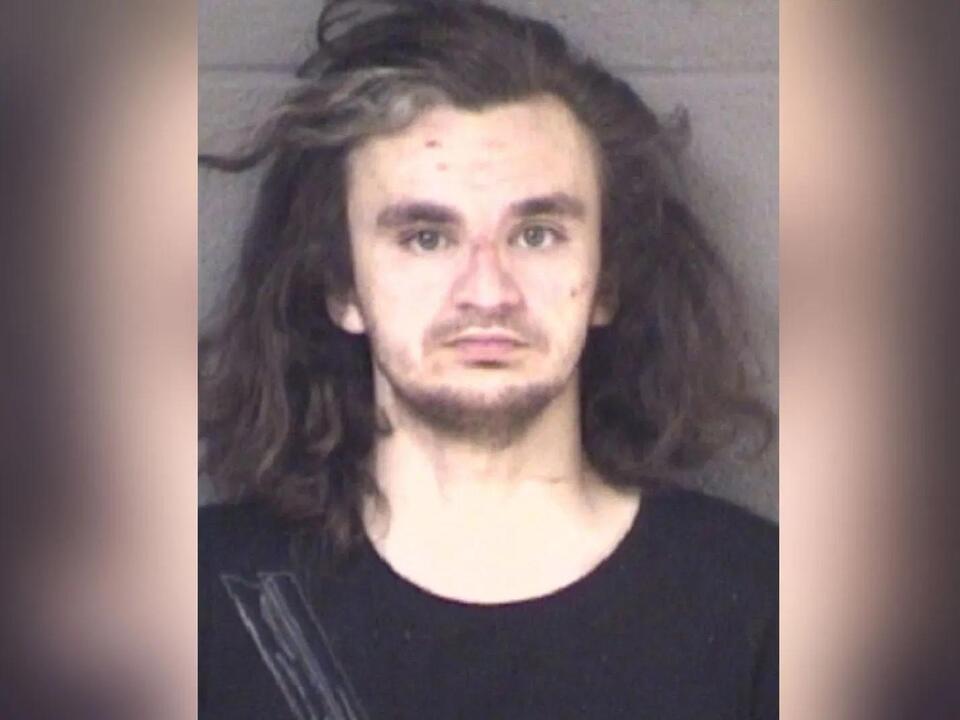Man accused of setting fire at apartment taken into custody, charged ...